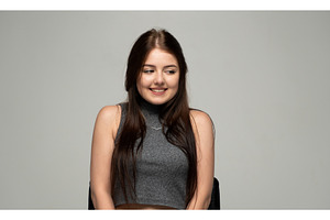 Young smiling brunette woman looking, a Person Photo by volodymyrshtun13795