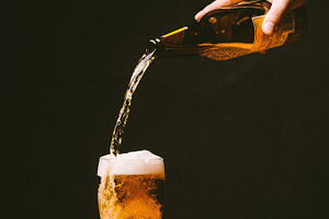 Pouring beer stock photo containing beer and beverage