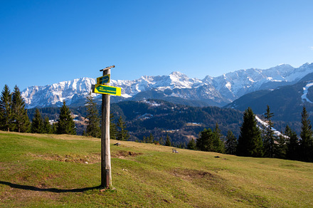 Winter landscape with a trail sign