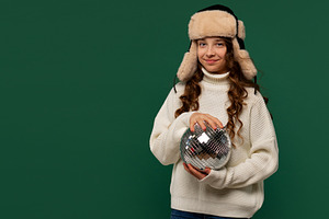 Young girl in fur hat, a Holiday Photo by Elena Vagengeim