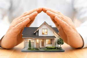 Protecting a house with hands, a Photo by Beautiful things