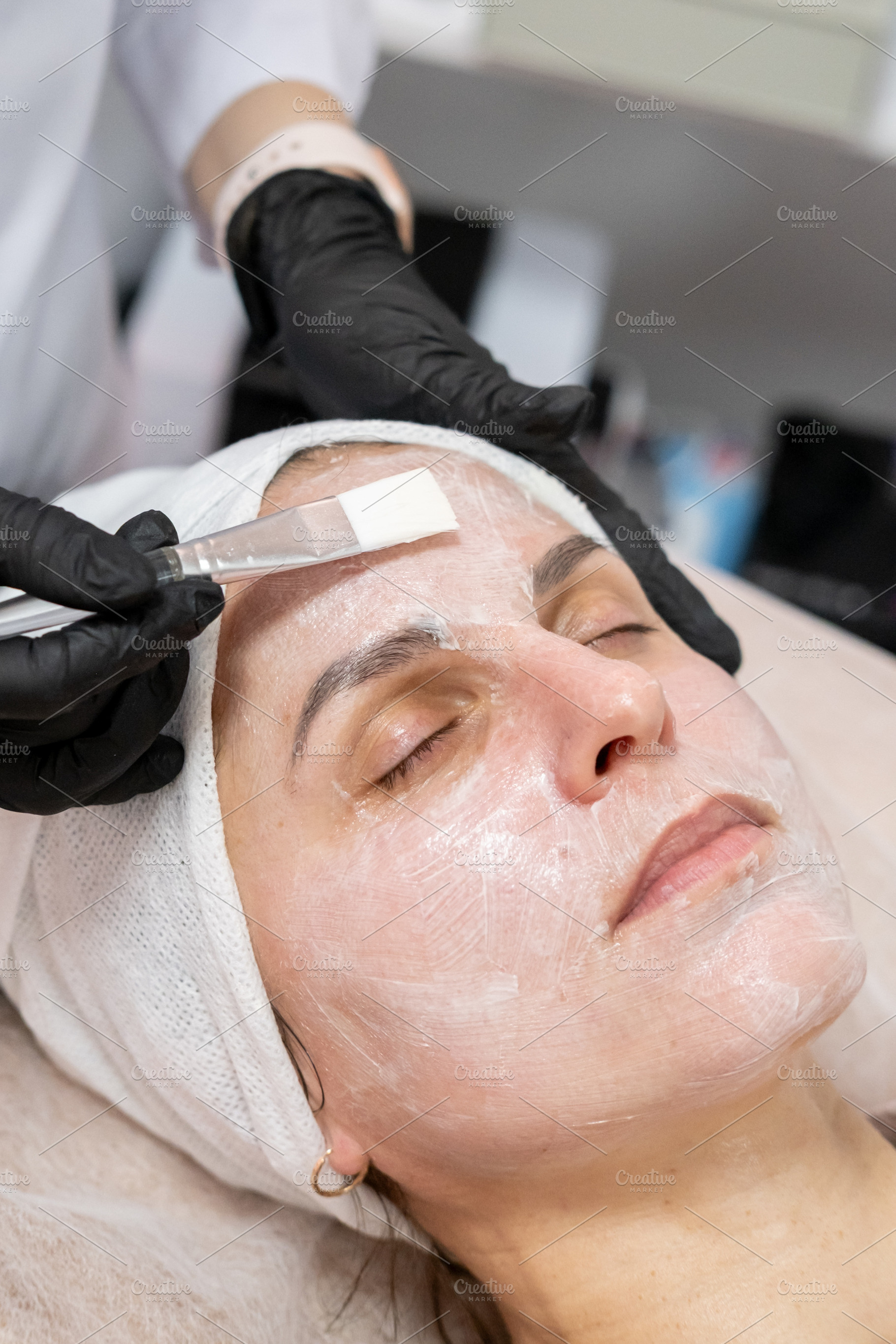 Cosmetician mask beauty care female face treatment, a Person Photo by Photo Drive Studio