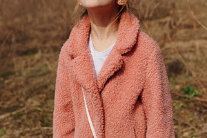 Cute little girl with red coat containing girl, field, and child