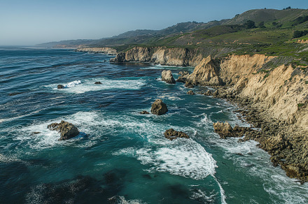 The coastline features stunning rock, a Photo by Tanuart