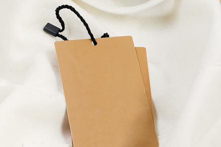 Empty brown cardboard tag with  string, a Background Photo by vimart