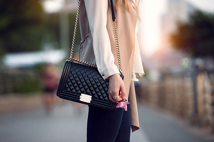 stylish female black leather bag, a Person Photo by New York Art Store
