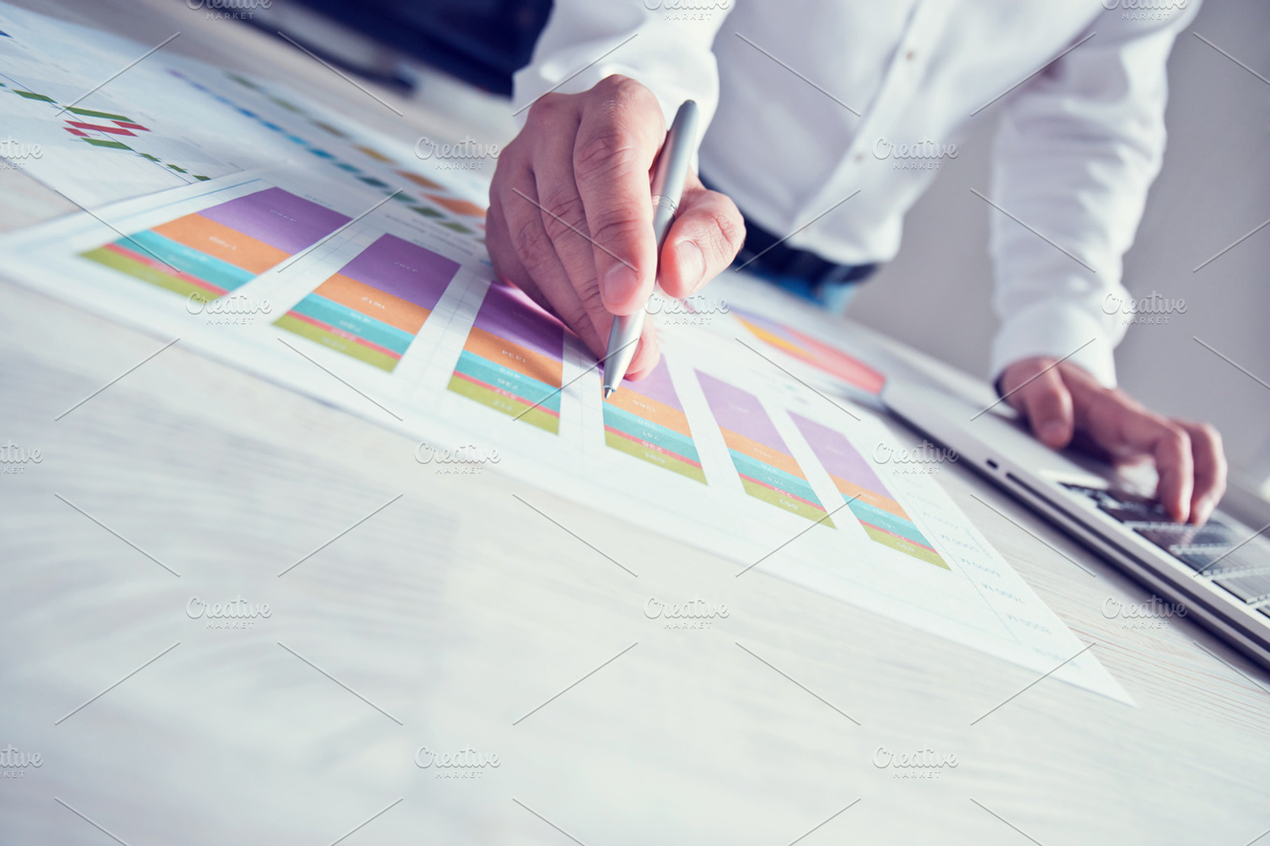 Businessman working in the office stock photo containing phone and office, a Business Photo by MaxFrost
