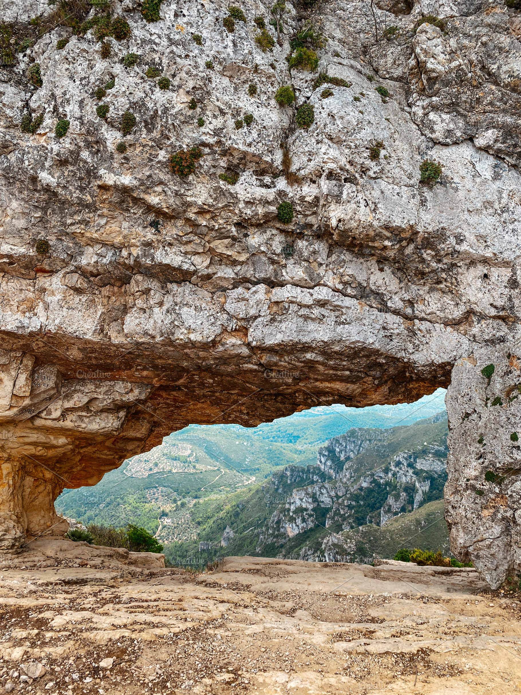 view of La Foradada rock arch in Serra del Montsia, a Photo by Nito