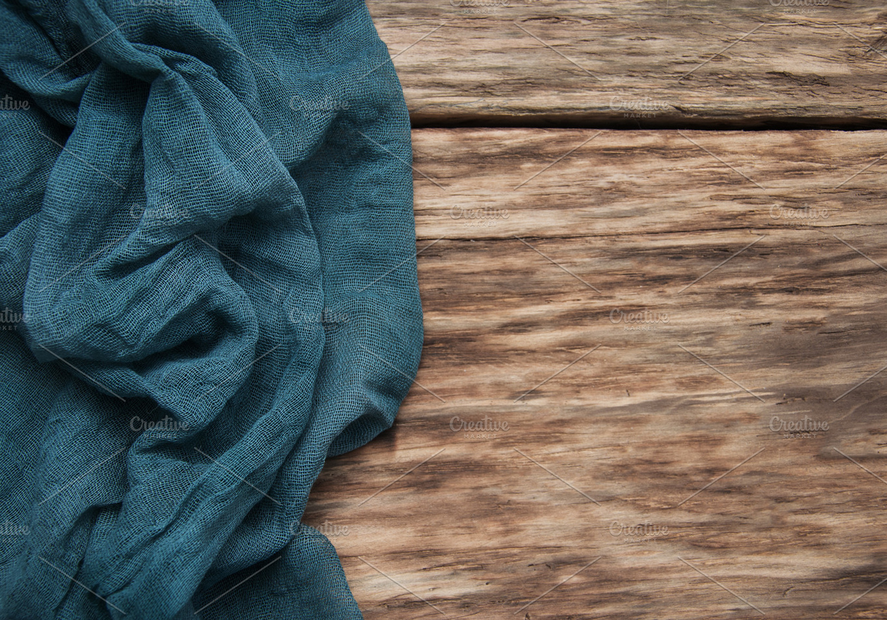 Napkin on a old wooden background featuring table, wood, and background, an Abstract Photo by Olena Rudo