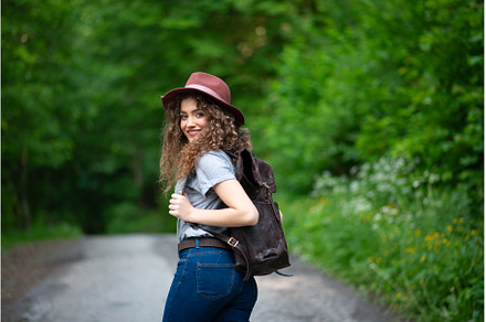 Young tourist woman traveller with, a Person Photo by HalfPoint