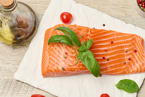 Raw salmon steak, top view, a Food & Drink Photo by ndanko
