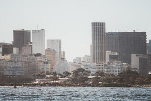 Telephoto coastal city skyline, an Architecture Photo by SkyNext
