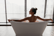 Back view of young lady taking foamy bath, looking aside at free space at home, a Photo by Prostock-Studio (Thumbnail 1 of 2)