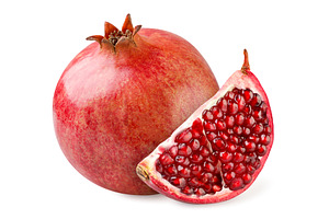 Ripe pomegranate fruit and slice, a Food & Drink Photo by innakreativ