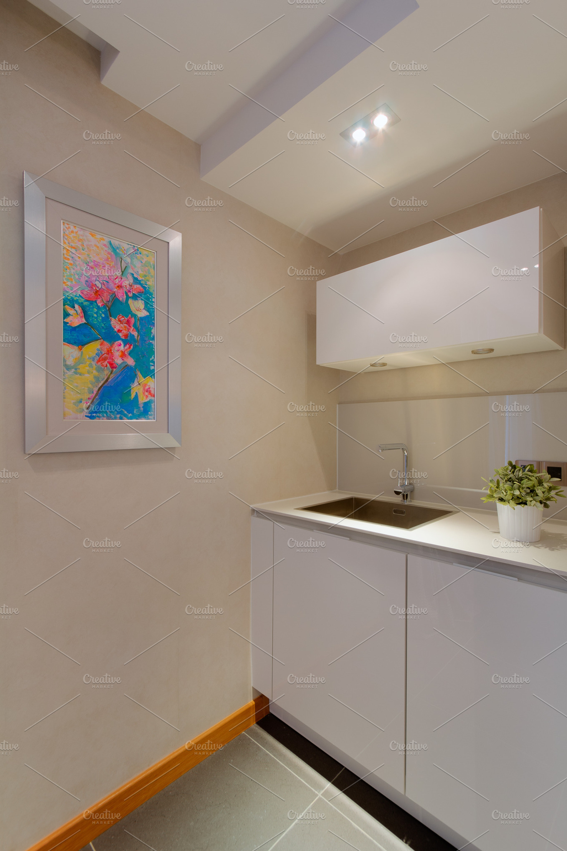 Kitchen interior stock photo containing beige and cabinet, an Architecture Photo by oyunerdene99