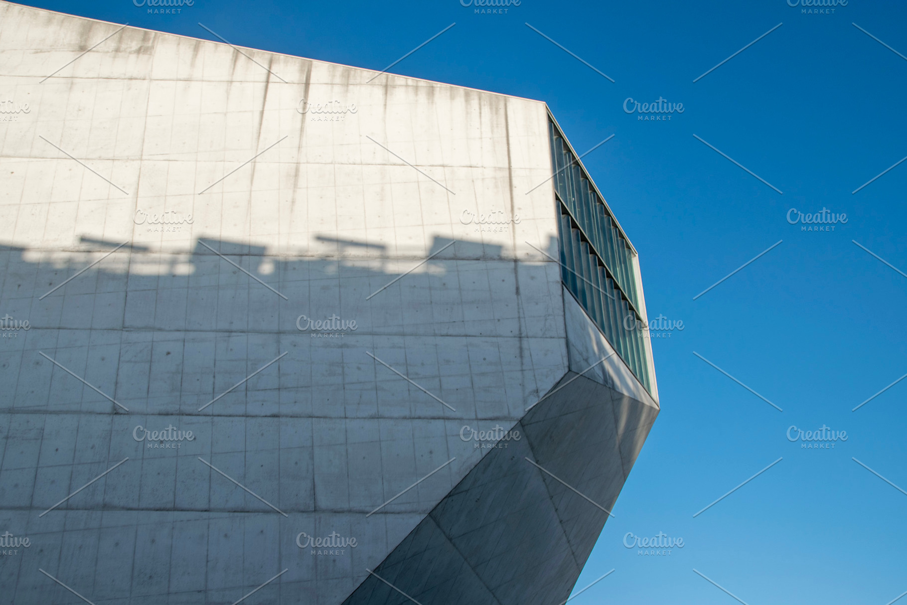 Contemporary concrete architecture at cultural center, a Photo by DanFLCreativo