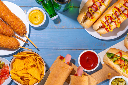 National Hot Dogs day background, a Food & Drink Photo by Rimma