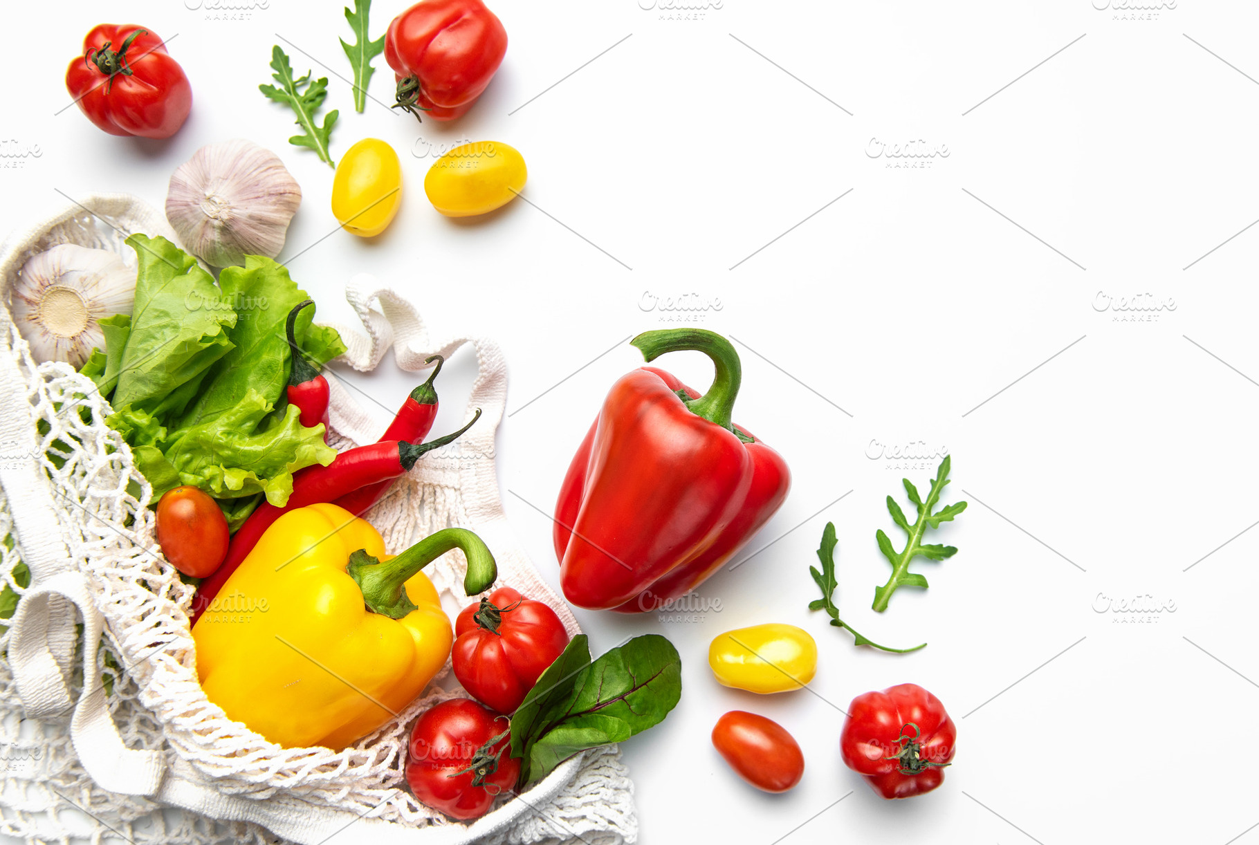 Fresh organic vegetables in mesh shopping bag, a Photo by Olena Rudo