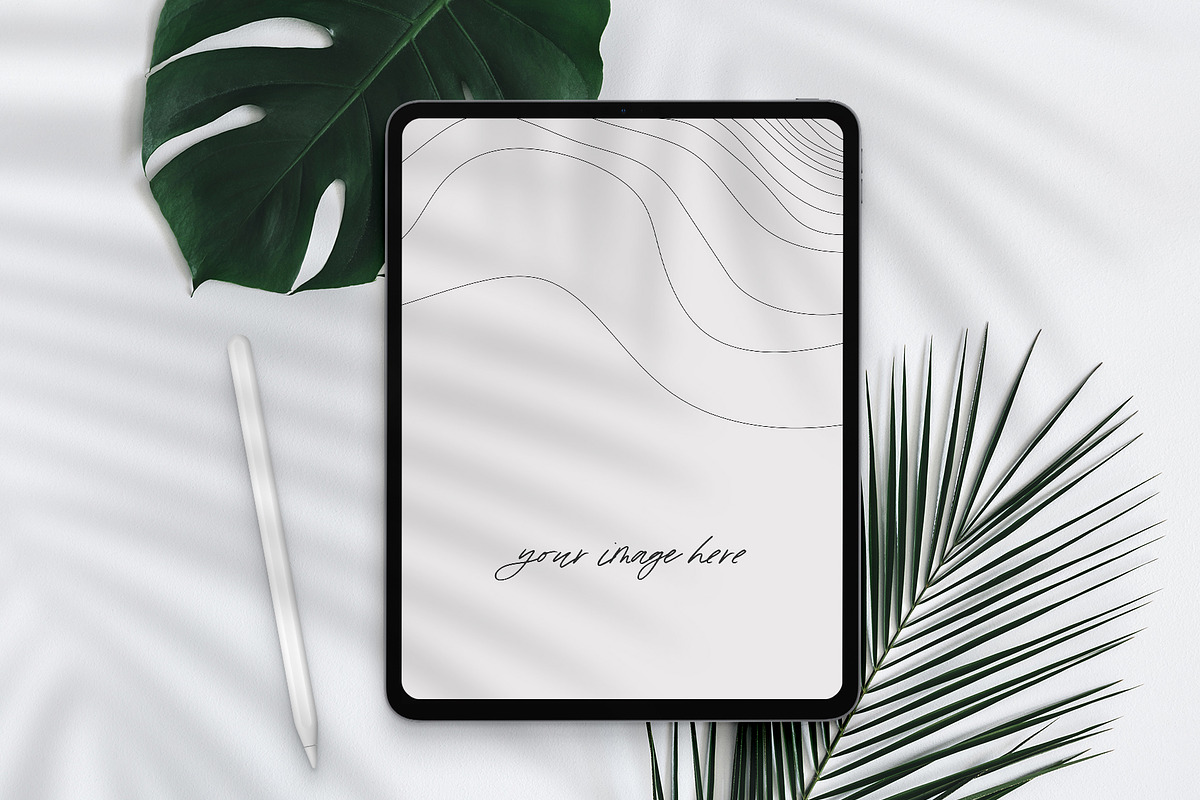 Monstera Palm Leaf - iPad Pro Mockup, a Books & Magazine Mockup by 89 Golden Blvd (Photo 4 of 4)