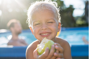 Little boy eating fresh apple, a Nature Photo by HalfPoint