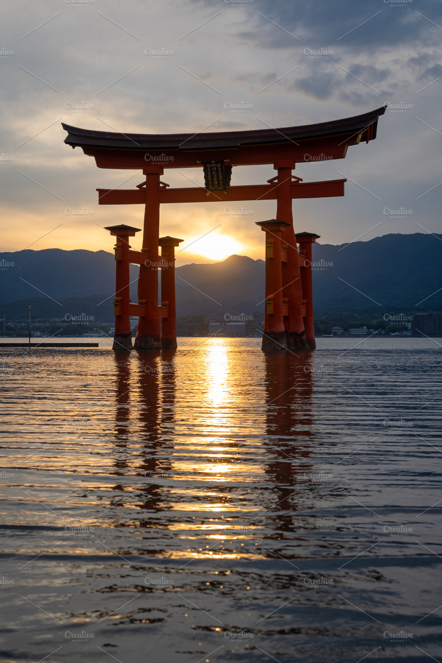 Famous red torii gate of Itsukushima shrine at sunset in Miyajim, an Architecture Photo by GoodGoods