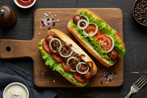 Two gourmet hot dogs with lettuce, t, a Food & Drink Photo by professorinc