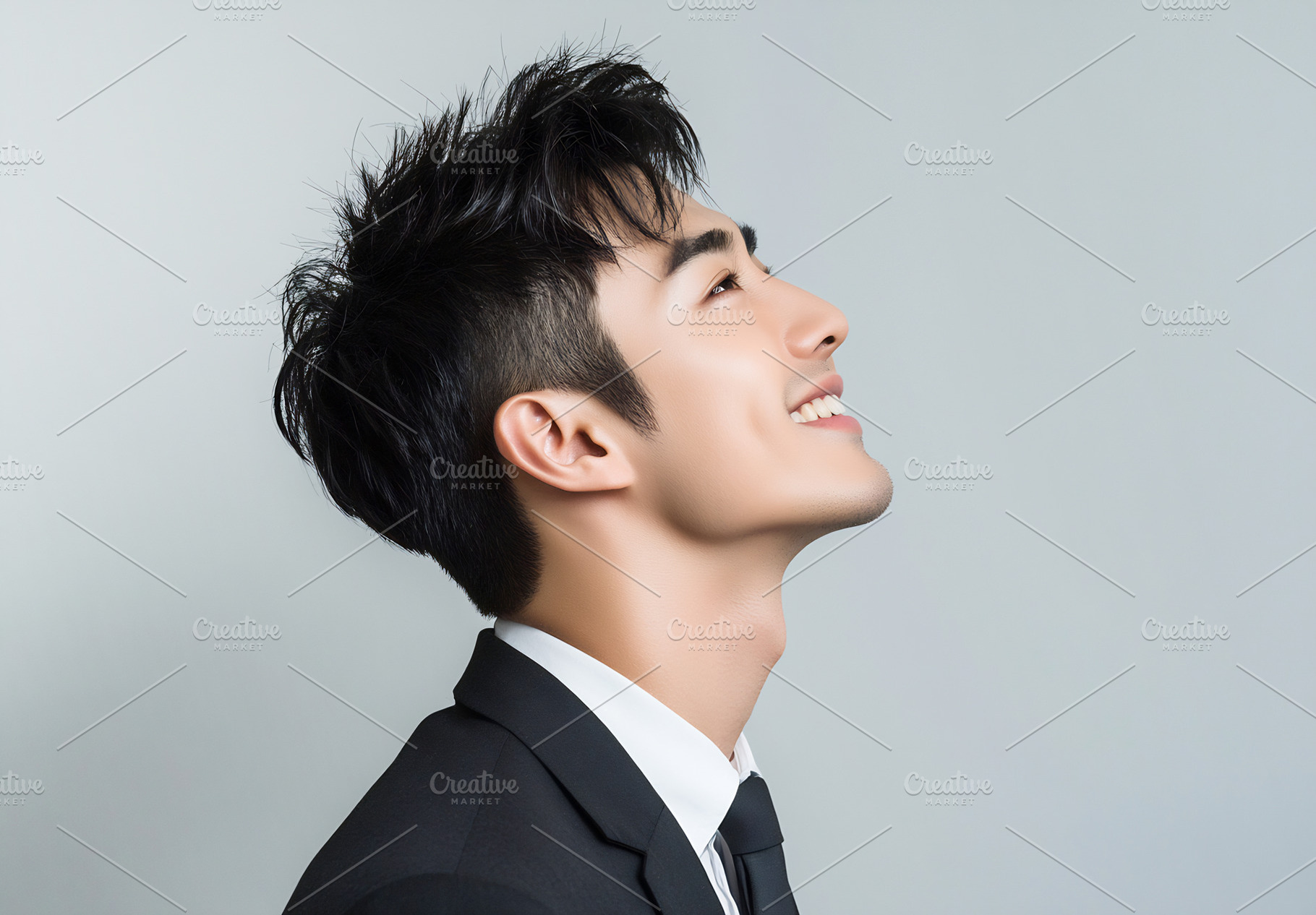 Portrait of a man in a suit smiling, a Photo by Beautiful things