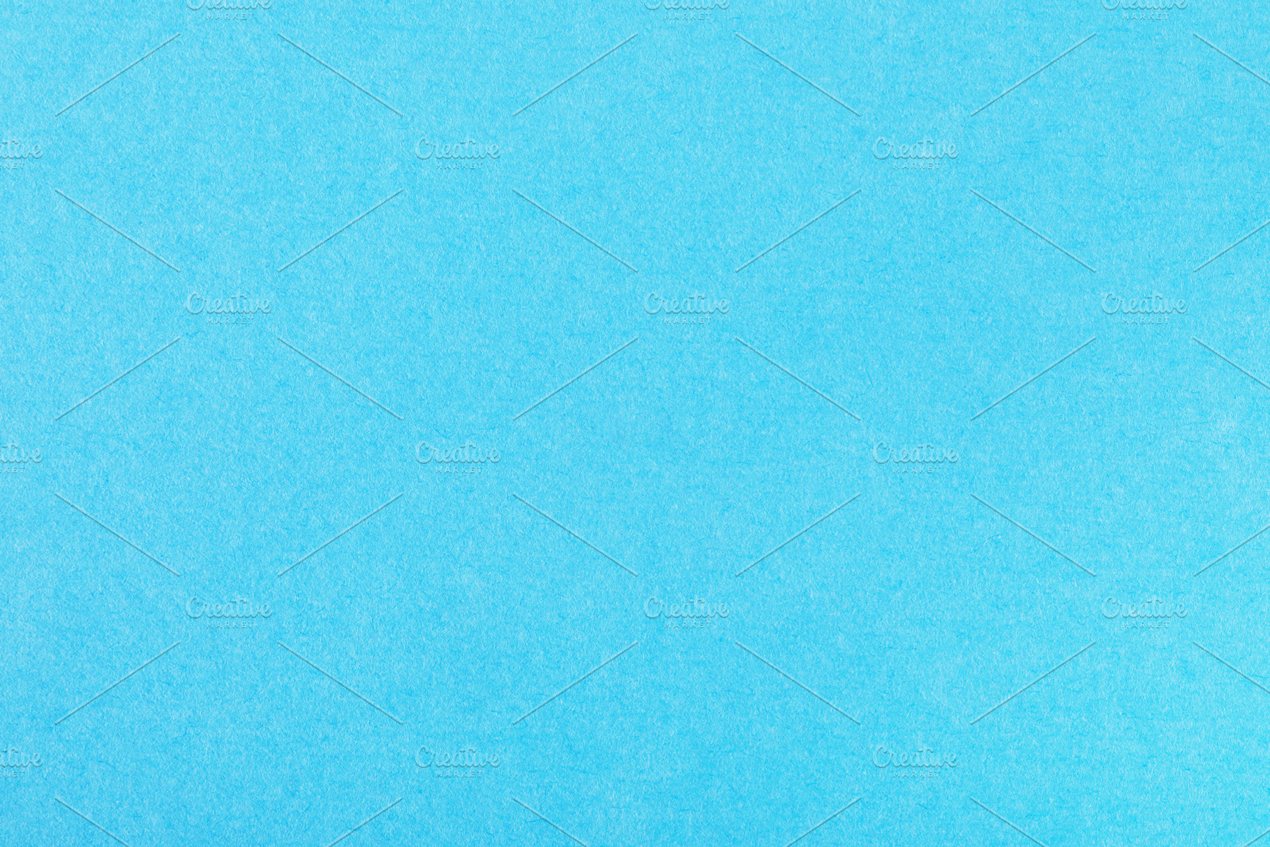 Bright blue paper texture with soft, even color and subtle grain, a Background Photo by Ales Munt