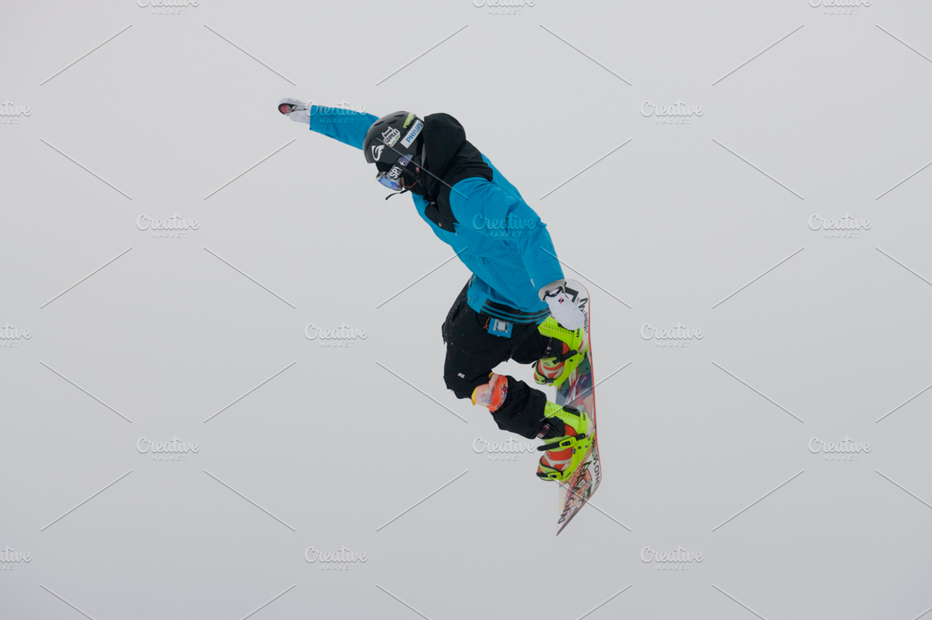 Snowboarder in flight stock photo containing snowboarder and athlete