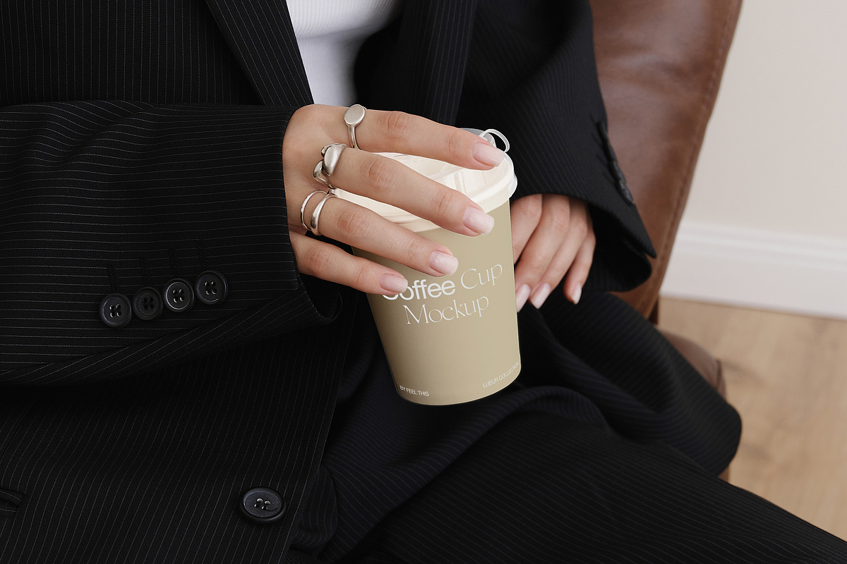 Coffee Cup in Hand Mockup PSD, a Cups & Container Mockup by Feel This (Photo 2 of 3)