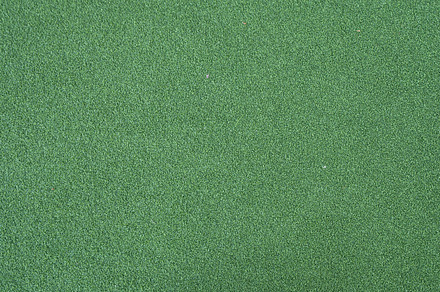 Lush green field pattern surface texture. Close-up of exterior n, a Background Photo by Tampatra