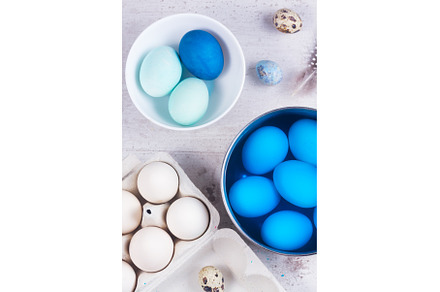 Painting eggs for easter, a Holiday Photo by Neirfy