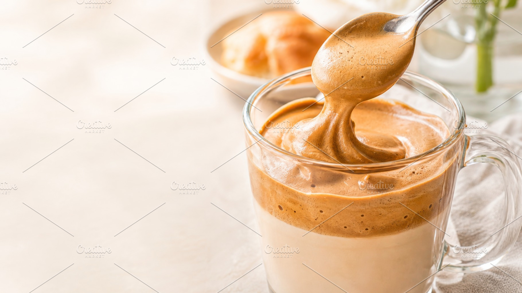 Creamy dalgona coffee with textured, a Photo by Dvoevnore photos
