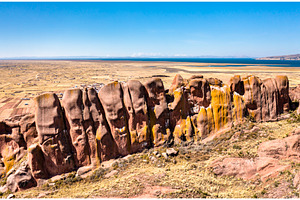 Reddish rock formations in Aramu, an Architecture Photo by Leonid Andronov