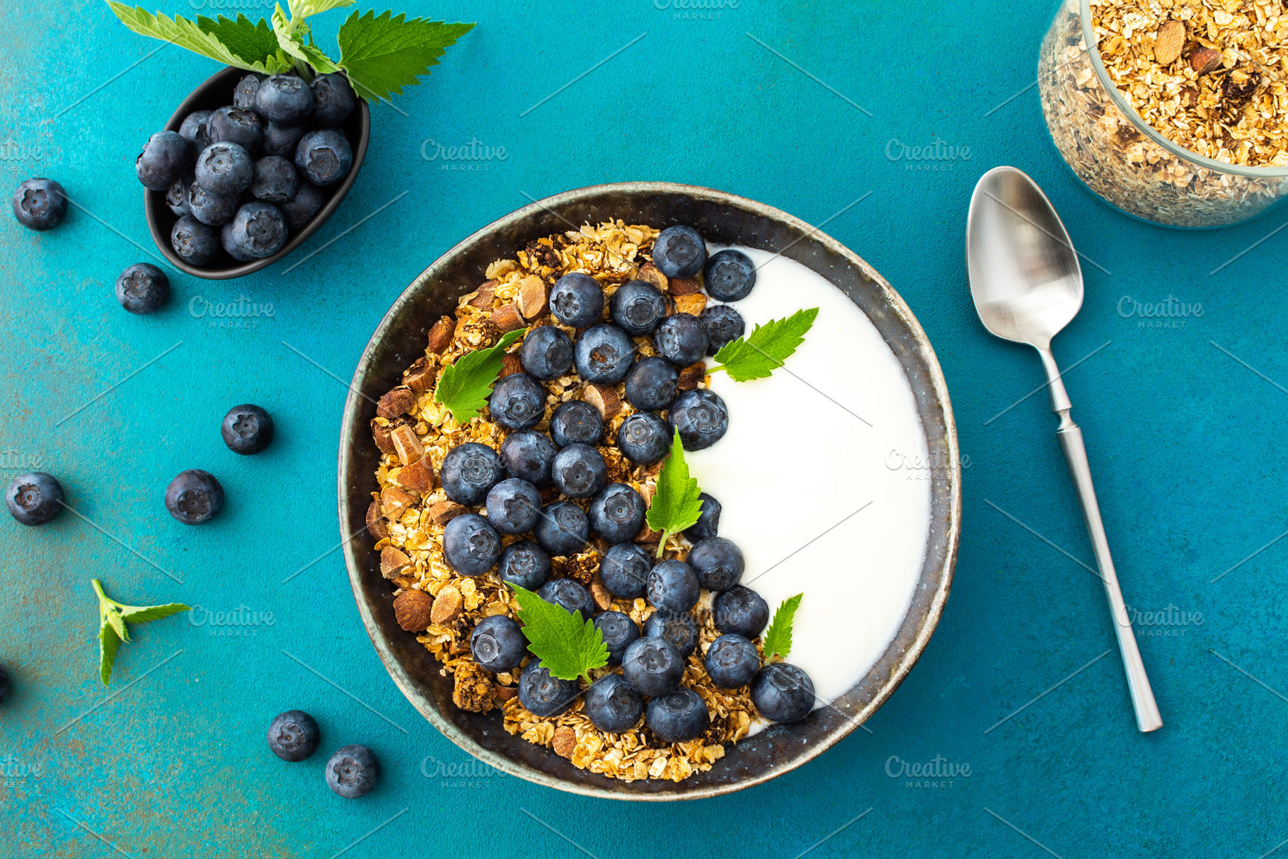 Granola with yogurt and blueberries, a Food & Drink Photo by Pandateam