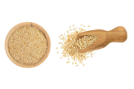 Sesame seeds in wooden bowl and, a Food & Drink Photo by NataPhoto