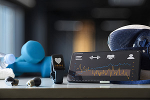 Sports activity tracking apps on phone and smartwatch in gym, a Sports & Recreation Photo by Davizro's Market