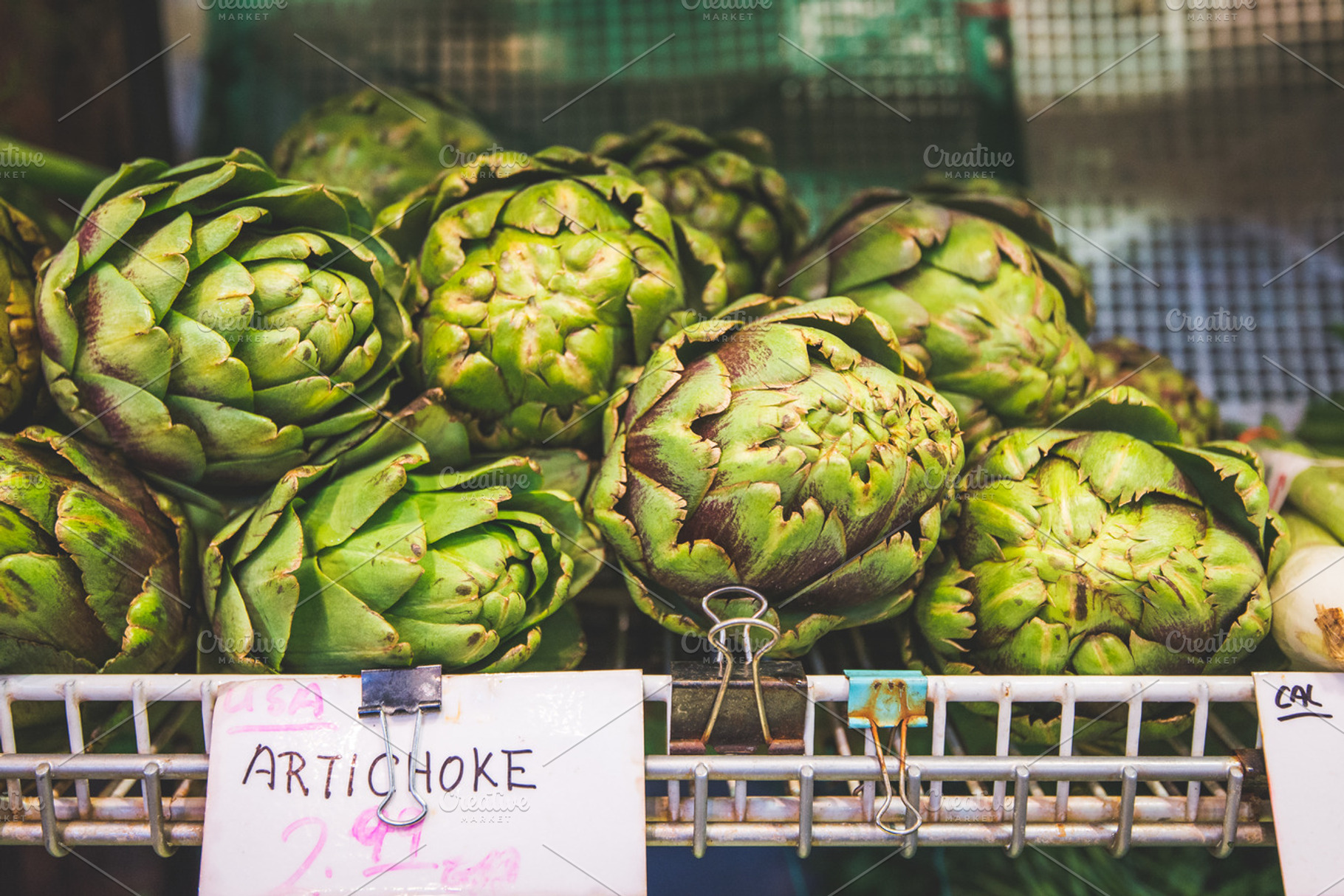 Artichokes containing artichoke, vegetable, and green, a Food & Drink Photo by Kelly Van de Vliet