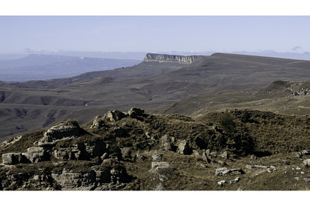 Beautiful sunny valley with rock, a Nature Photo by Media Whale Stock
