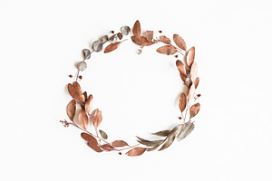 Autumn wreath featuring wreath, eucalyptus, and autumn