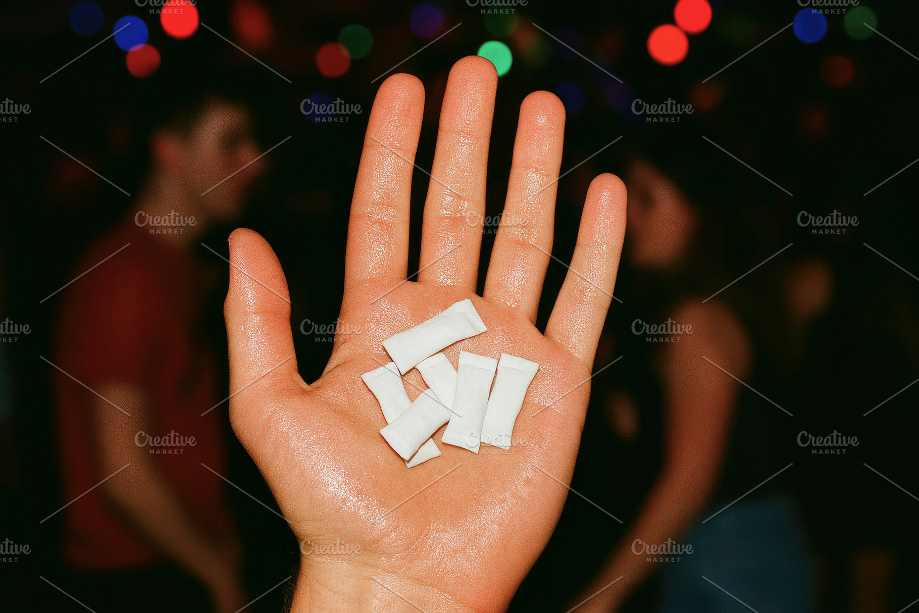 hand holding white nicotine pouches, generative AI, a Photo by Nito