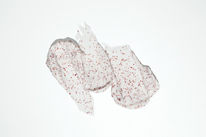 Smears of body scrub. Cosmetic smear. Fruit and berry body scrub texture of swa, a Photo by matucha