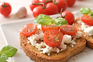 Close-Up Tomato and Feta Toast with Basil, a Food & Drink Photo by Davizro's Market