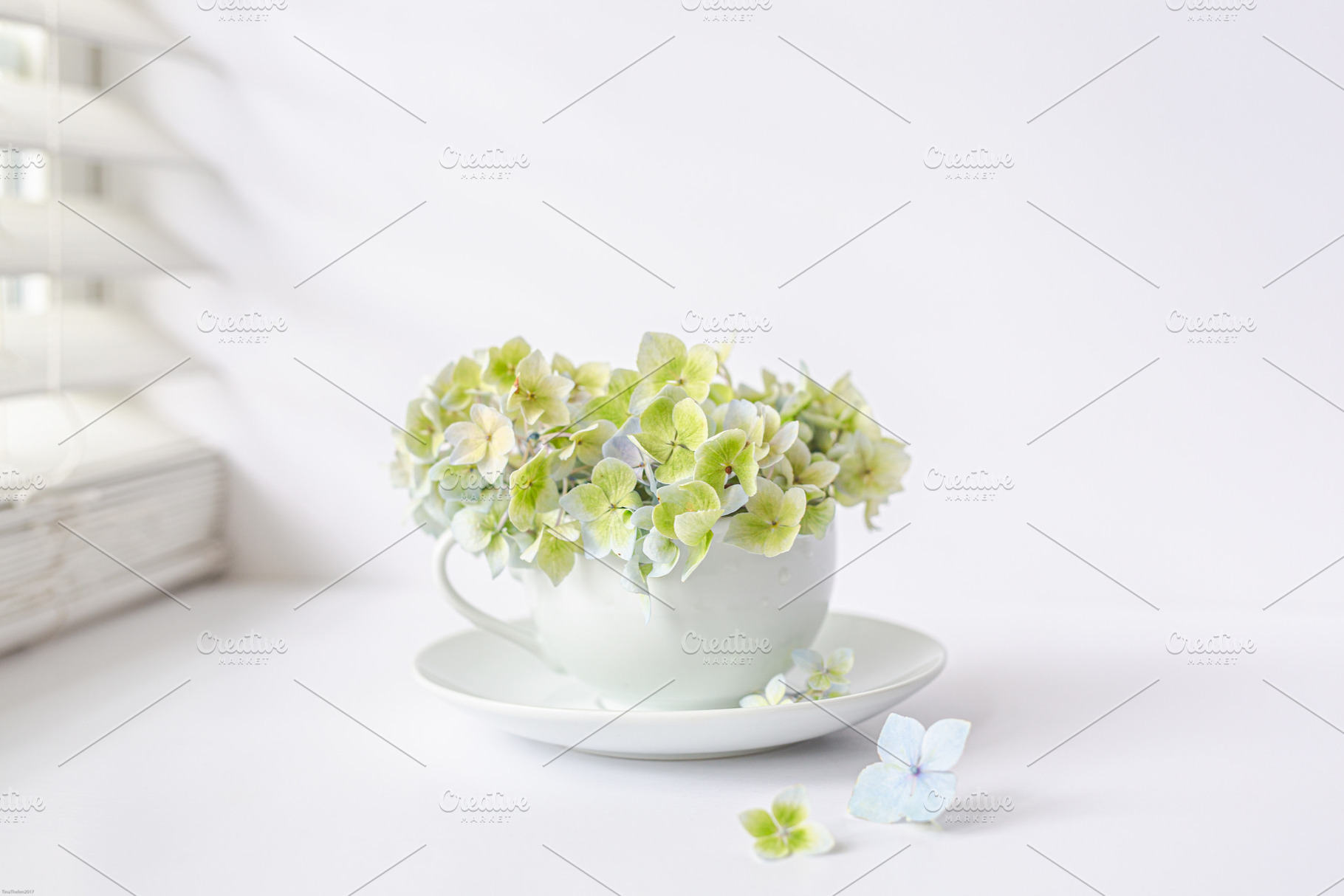 White teacup with flowers containing stock photo, styled stock photo, and, an Arts & Entertainment Photo by Tina Thelen Photography