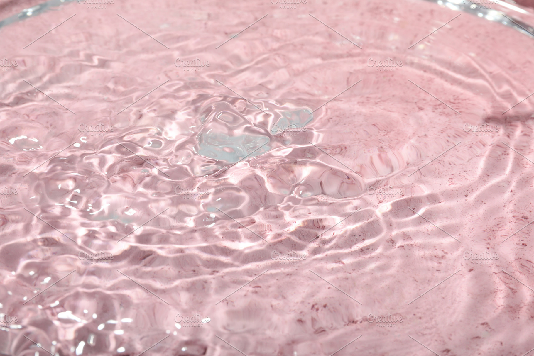 Concept of summer and freshness, water on pink background, a Food & Drink Photo by AtlasStudio PRO