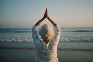 elderly woman with hands in prayer, generative AI, a Photo by Nito