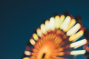 Out of focus ferris wheel stock photo containing bokeh and night