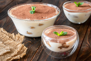 Three classic Italian tiramisu, a Food & Drink Photo by Alexander Prokopenko