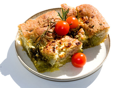 Savory focaccia with green topping, a Food & Drink Photo by Irina