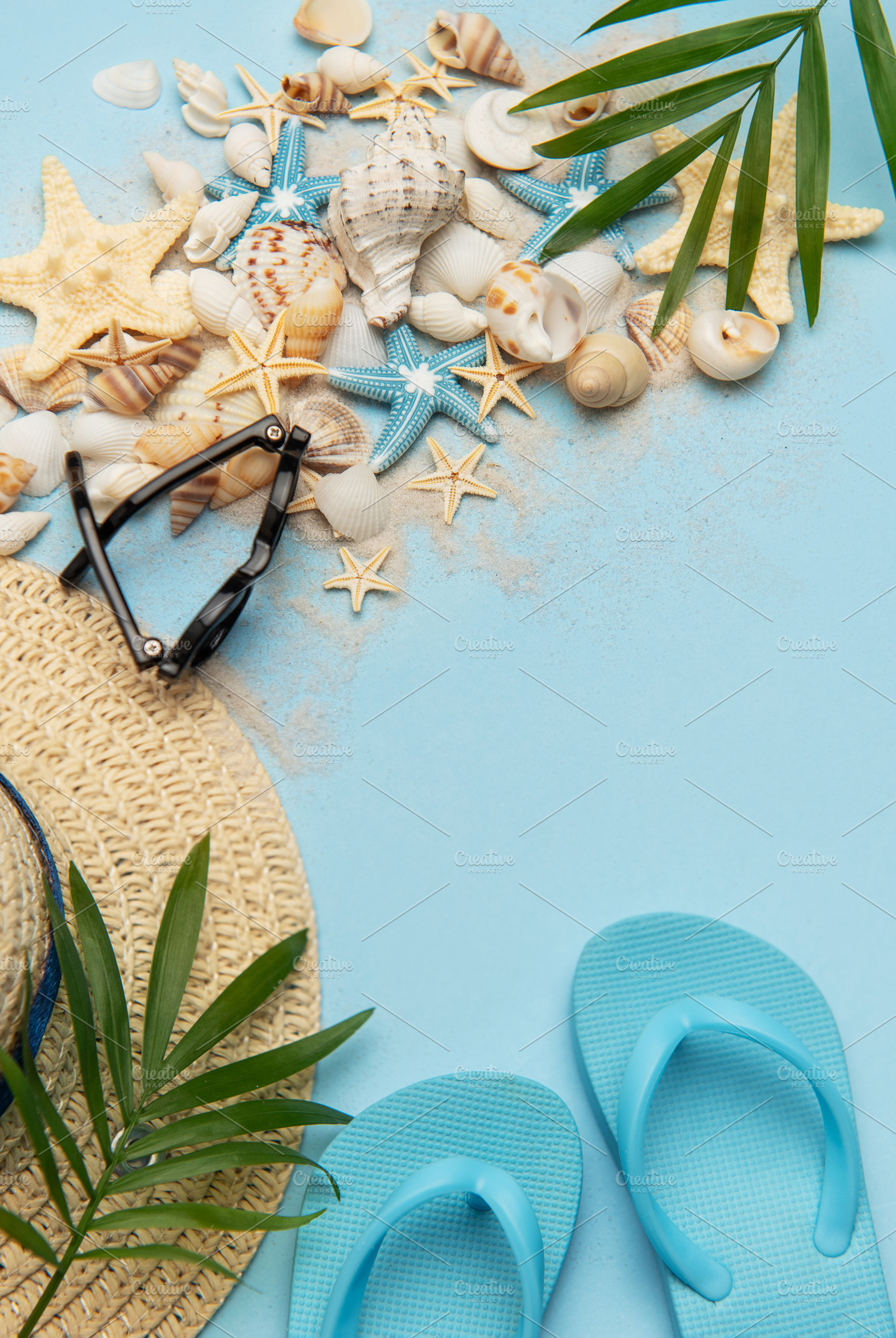 Beach accessories creating a summer holiday background with copy, a Holiday Photo by Olena Rudo